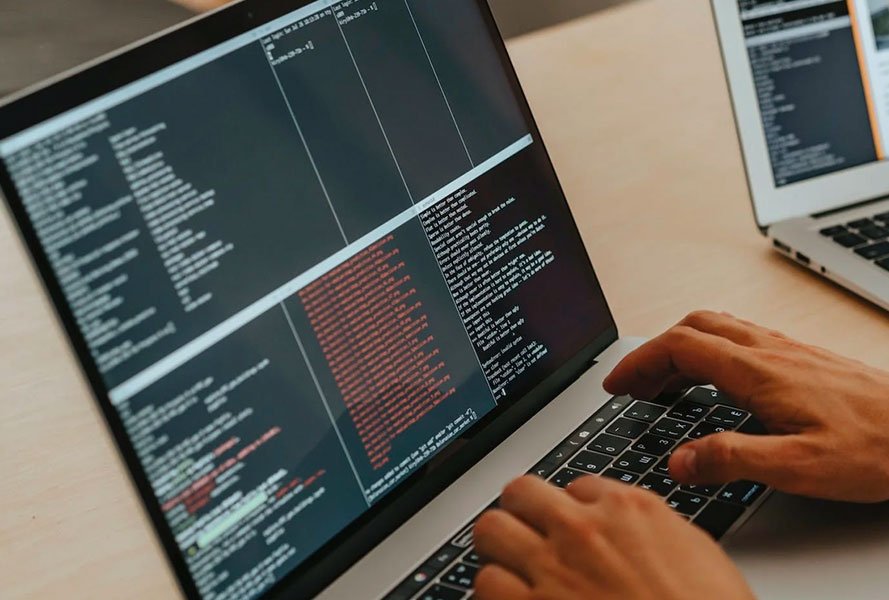 WordPress Designer & Developer 2 Laptop screen displaying custom code for web development, showcasing bespoke programming and development services by Definition Web in New Zealand